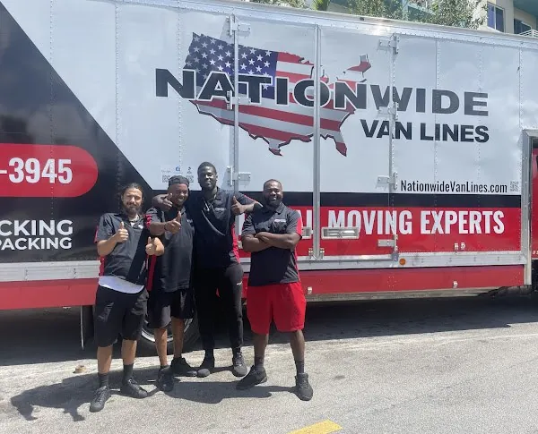 Nationwide Van Lines crew in front of their box truck